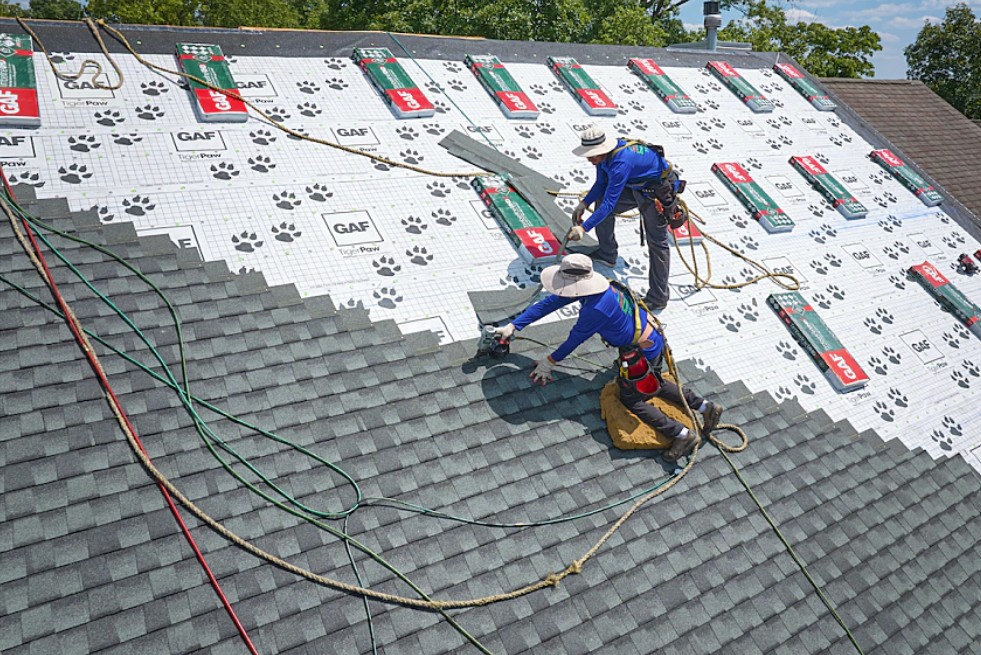 Roof in progress showing GAF Tiger Paw underlayment and Pro-Start starter strips before shingles are laid
