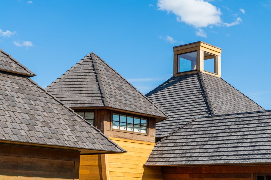 Multi-peak roofline finished in deeply textured DaVinci synthetic shake